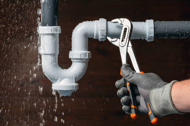 Professional Emergency Plumber technician working in Woodside, DE